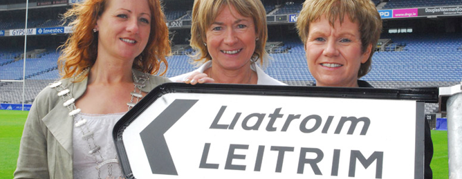 three ladies with Leitrim sign